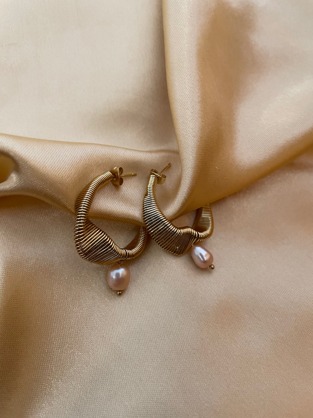 Gold hoop earrings with pink organic baroque pearl drops