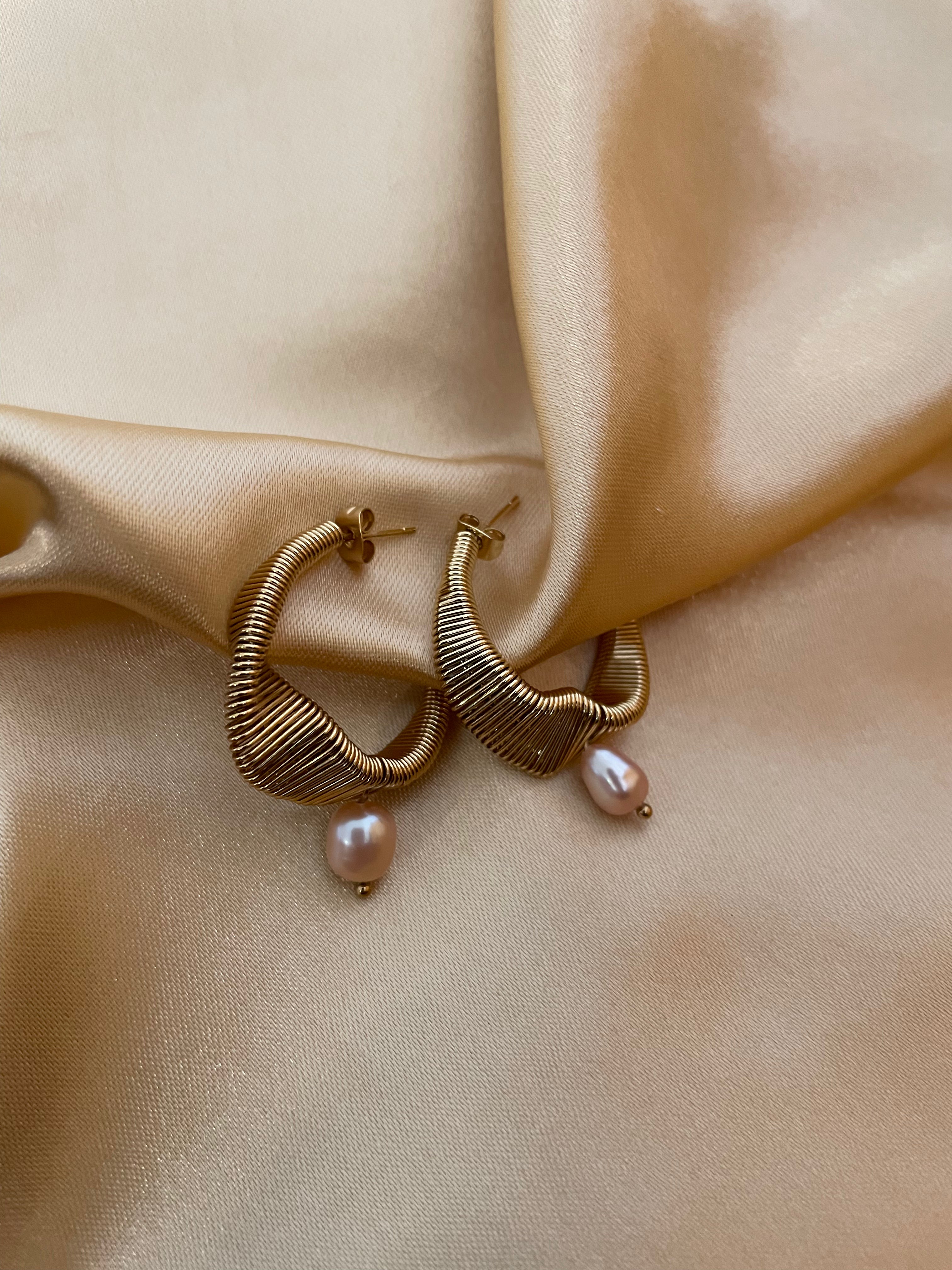 Gold hoop earrings with pink organic baroque pearl drops
